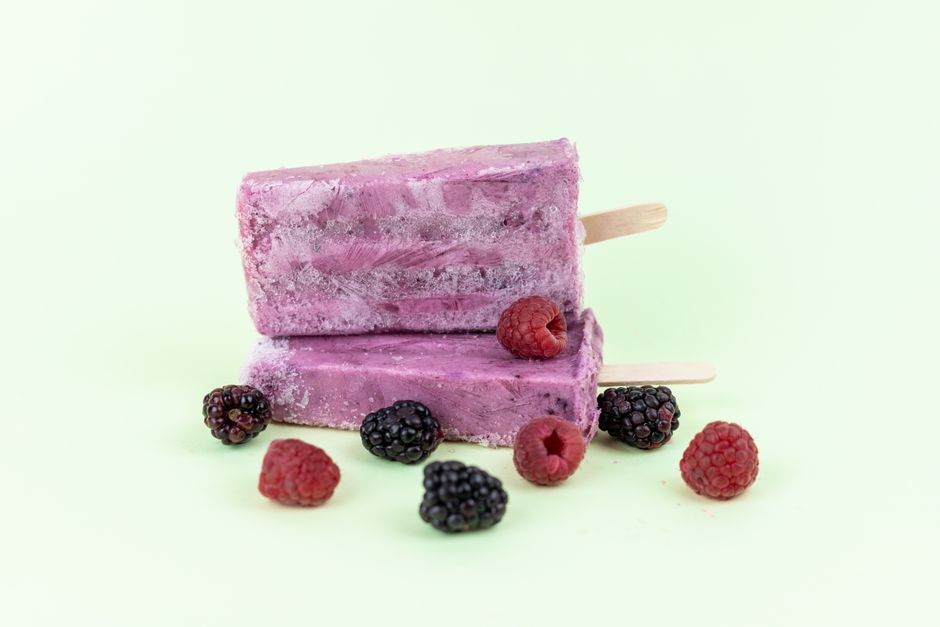 Berry yogurt popsicles with fresh berries